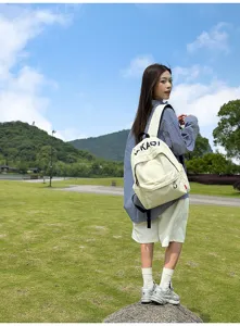 Detailed view of casual canvas backpack featuring durable fabric and stylish outdoor design.