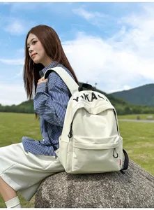 Casual Korean style canvas backpack for women and students, lightweight and stylish daily bag.