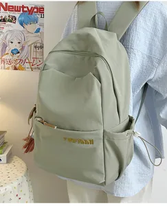 Casual minimalist large capacity backpack in light green, ideal for daily school and hiking.