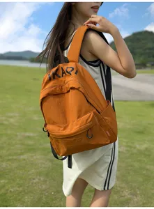 Casual canvas backpack for daily outdoor commuting, stylish campus daypack with roomy storage.