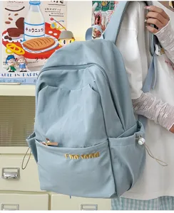 Light blue large capacity casual backpack with multiple pockets and comfortable shoulder straps.