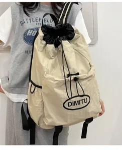 Lightweight drawstring backpack for outdoor sports, travel, and casual daily use in beige.
