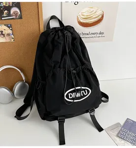 Black drawstring backpack, casual sports outdoor travel lightweight rucksack for use.