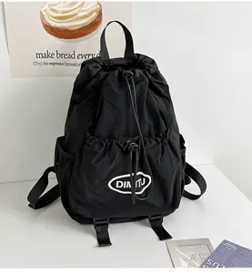 Lightweight black drawstring backpack, outdoor mountain style shoulder bag for travel daily use.