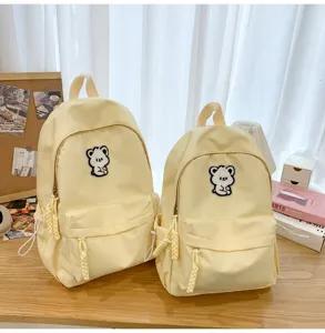 Cute canvas school backpack for teen girls casual daily daypack with bear patch yellow