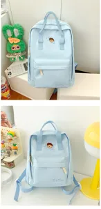 Light blue casual backpack for students, cute canvas school bag with sweet ins style and pockets.