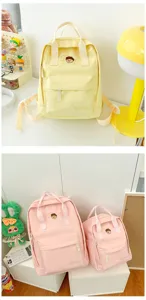 Close-up view of the cute casual school backpack showcasing its neat stitching and front pocket.