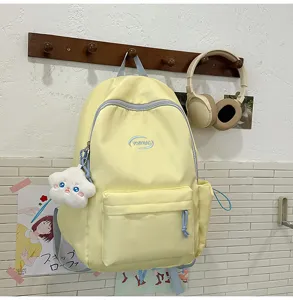 Linda mochila escolar estética para chicas adolescentes, mochila informal con colgante.