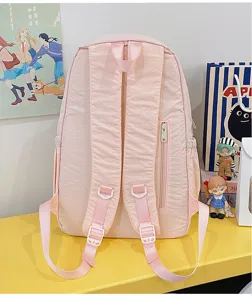 Pink casual student backpack, lightweight and simple design, ideal for daily use and school.