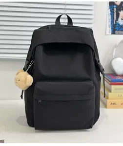 Casual black nylon school backpack for daily use, lightweight and stylish daypack.