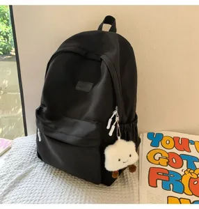 Japanese style minimalist black canvas backpack for students, casual daily casual school bag.