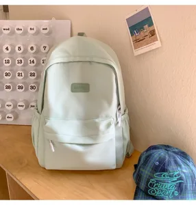 Japanese style minimalist solid color backpack for students, casual daily school book bag.