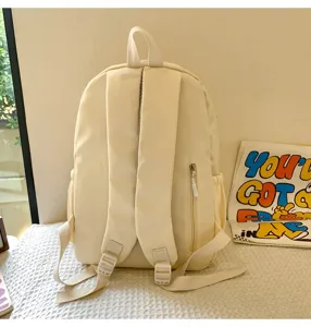 Minimalist plain student backpack, casual canvas school bag for daily commuting and travel.