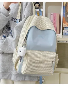 Plaid canvas backpack detail showcasing fresh Japanese ins style and cute cloud pendant.