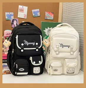 Japanese style multi-pocket canvas school backpack for students, large capacity computer bag.