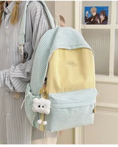 Japanese ins style plaid backpack for school girls, large capacity casual student travel bag.