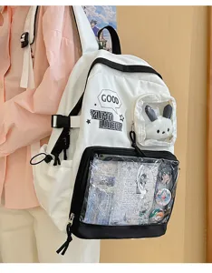 Mochila de lona en blanco y negro con ventana ita transparente y bolsillo de peluche de conejo.