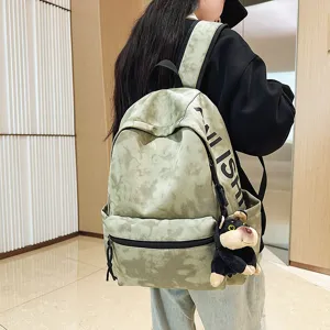 American vintage backpack for women, stylish large capacity school bag for college students.