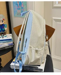 Ins Japanese style plaid backpack for women, cute student school bag with large capacity.