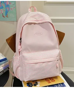 INS style Japanese pink plaid backpack for women, large capacity student school bag casual daypack.