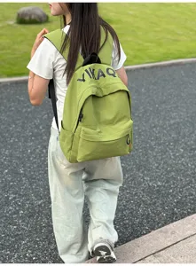 Casual green canvas backpack for daily commuting, school, or travel with stylish aesthetic.