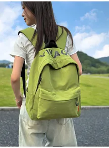 Green casual backpack for women, stylish Korean fashion school bag for students and daily use.
