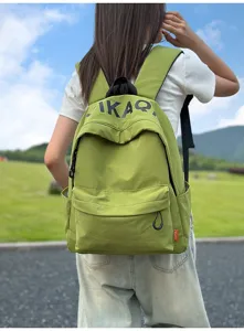 Casual green canvas backpack for women, lightweight Korean style daily school bookbag.