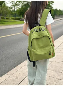 Korean style casual green backpack for teenage students, lightweight daily school bag new.