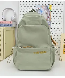 Green canvas backpack detail view, minimalist casual daily school bag with spacious capacity.