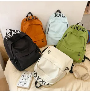 Casual canvas backpack korean style multi color school bag for daily travel and student use