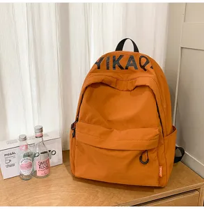 Lightweight Korean style orange backpack for women casual campus school bag stylish daypack