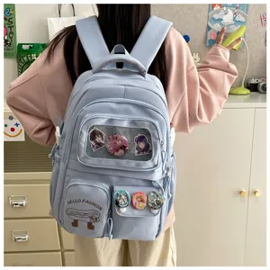 Cute aesthetic Japanese style large capacity blue school backpack with clear window badges.