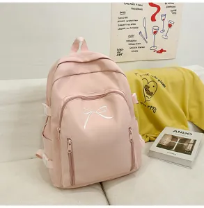 Cute Japanese style pink canvas backpack for school girls, large capacity casual daypack.