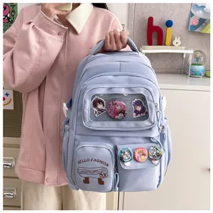 Cute Japanese style light blue backpack large capacity student school bag with anime badges