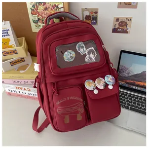 Cute Japanese style large capacity school backpack with clear window and anime pin badges.