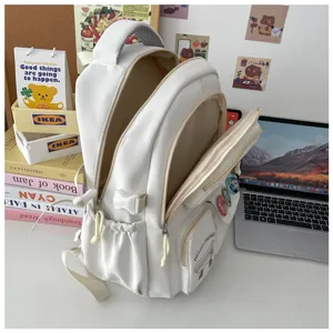 White aesthetic backpack with large capacity, cute design for students and daily casual use.