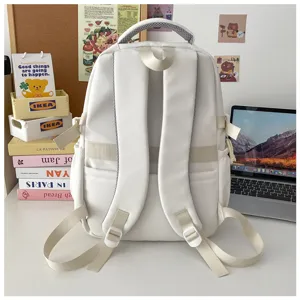 Minimalist white backpack, large capacity school bag, daily casual student bookbag.