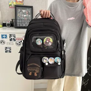 Black canvas student backpack with clear pocket, pins and hotdog print, large capacity.