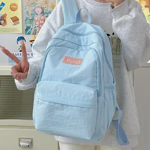 Light blue casual student backpack for women daily school bag simple nylon rucksack.