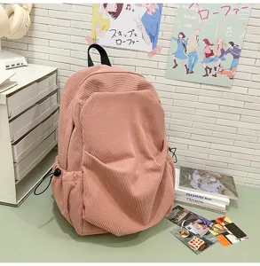 Japanese vintage corduroy backpack for women, casual college school bag with drawstring pockets.