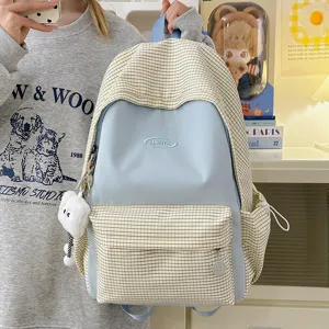 Japanese style plaid backpack for students, large capacity casual book bag for daily use.