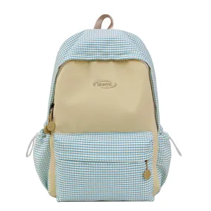 Japanese style blue and white plaid backpack with large capacity for students and travel use.