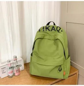 Casual green backpack for women and students, lightweight stylish daily daypack.