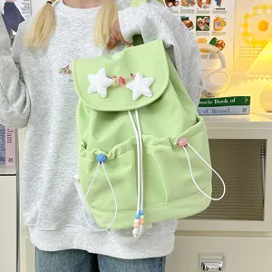Cute light green backpack for women with plush star charms and drawstring pockets, daily commute.