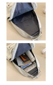 Detail view showing large capacity and internal structure of the white backpack.