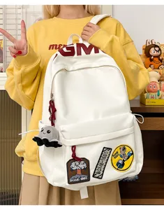 Large capacity casual white backpack with cool patches and letter print for daily use.