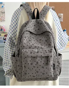 Corduroy backpack for women and students, cute heart bow print, lightweight casual school bag.