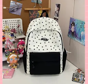 Black and white star print backpack, casual school bag for teenage girls and students.