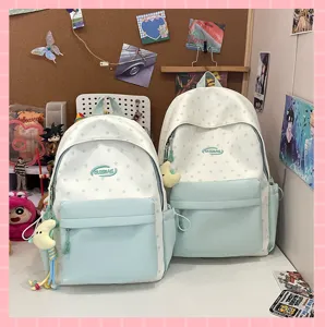 Cute star print student school backpack with front pocket and sweet pendant for daily use
