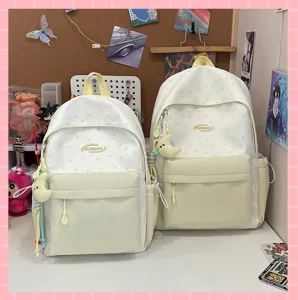 Cute star pattern student backpack set with front pocket and aesthetic school style design.